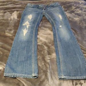 Distressed flare jeans